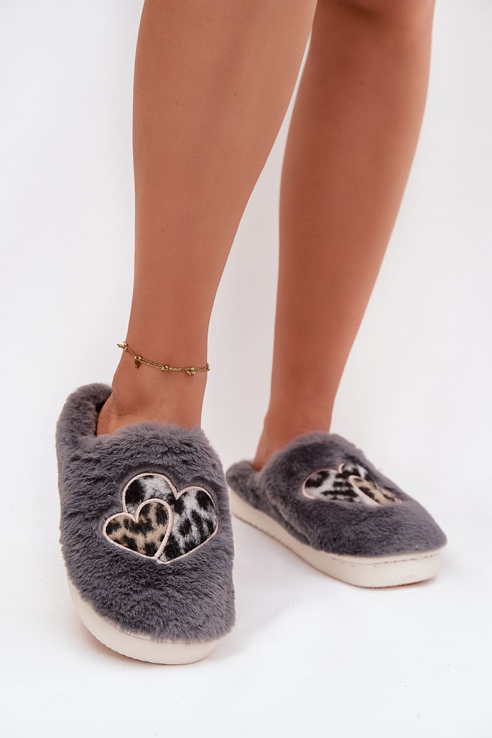 Step in Style Luxury Women's Fur Slippers, beautifully designed with heart embellishments for chic home wear.