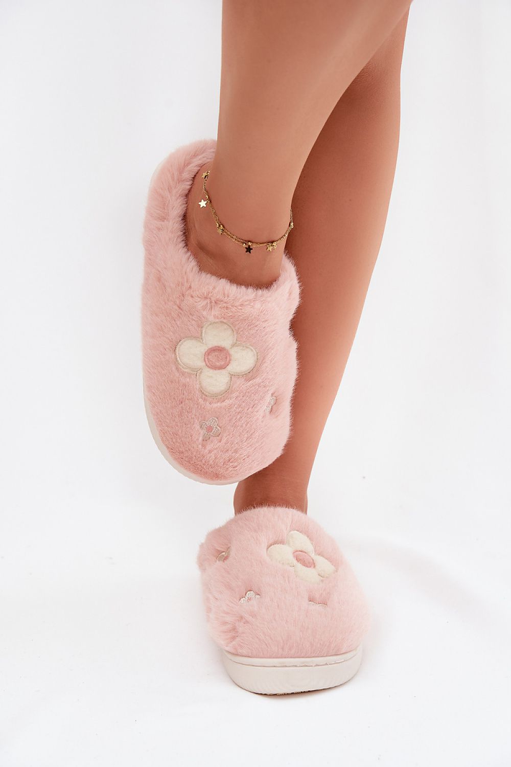 Step in Style Luxury Fur Women's Slippers showcasing plush interior and sturdy sole, ideal for fashionable relaxation at home.