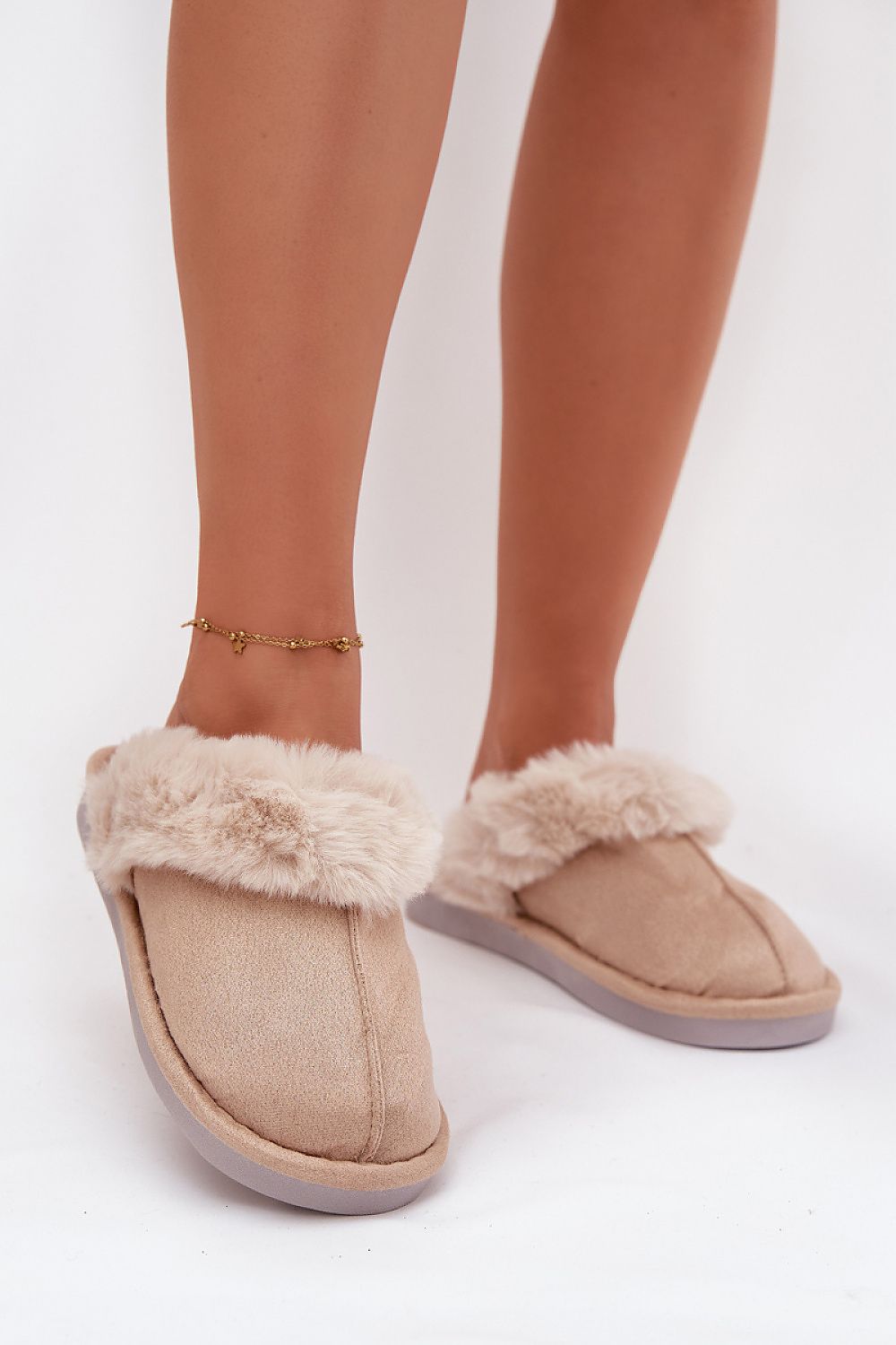 Step in Style's luxurious eco suede slippers with a subtle 2.5 cm sole height, offering both comfort and elevated style.