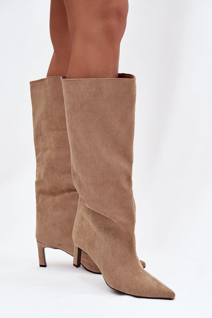 Elegant Women's Eco Suede Heel Boots by Step in Style styled with an evening dress, demonstrating versatility and elevated fashion for stunning night outings.