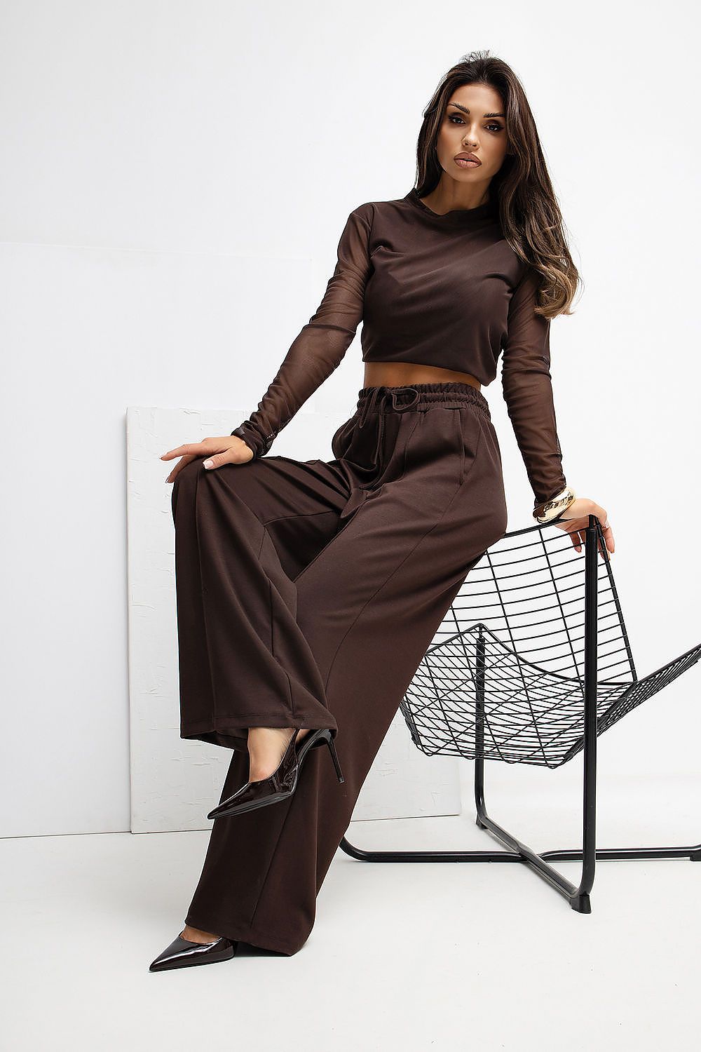 Close-up view of Rue Paris Luxury High-Waist Palazzo Sweatpants, highlighting the butter-like texture and subtle decorative seams for a sophisticated look.