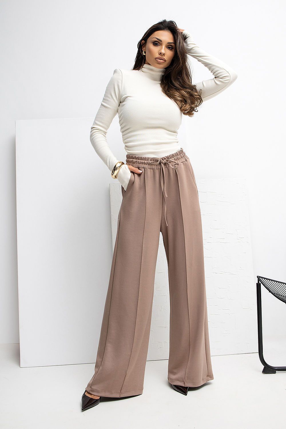 Close-up of luxurious high-waist palazzo sweatpants from Rue Paris showcasing the delicate butter-like texture.