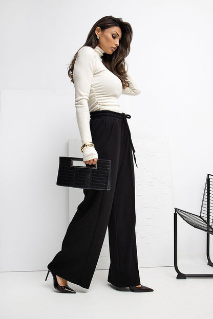 Close-up of the Butter-like texture of Rue Paris Luxury Palazzo Sweatpants, showcasing the exquisite viscose blend for ultimate comfort and luxury.