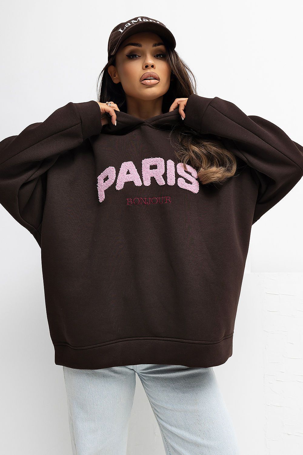Close-up of the chic embroidered inscriptions on the Comfortable Women's Hoodie Sweatshirt by Rue Paris, adding unique flair and sophistication to casual wear.