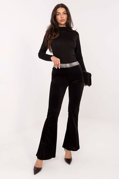 Chic Italian Velvet Bell-Bottom Trousers for Women by Italy Moda, combining wide-leg design and glamorous jet stone embellishment for a stylish silhouette.
