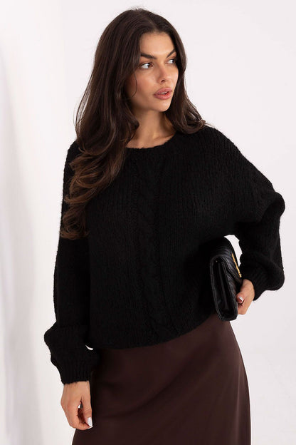 Model showcasing Italy Moda's puffy sleeve women's casual sweater in a chic casual setting, demonstrating its versatile style.