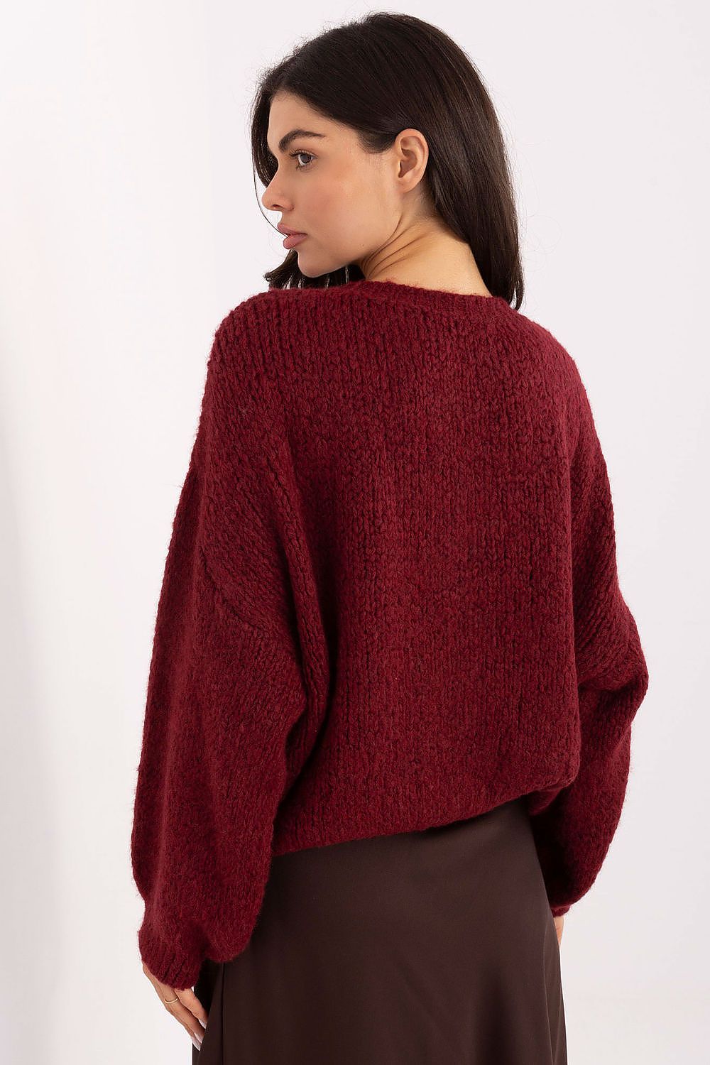 Woman wearing a Luxury Casual Sweater by Italy Moda, highlighting its versatile style for office and casual outings.
