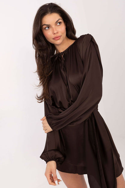 Model wearing the Elegant Italy Moda Jumpsuit, accentuating the puff sleeves and tailored fit, ideal for cocktail parties and elegant gatherings.