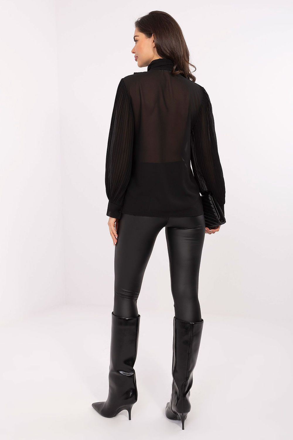 Model wearing the Elegant Long Sleeve Women's Shirt by Italy Moda, exemplifying its versatility for both casual and formal occasions.