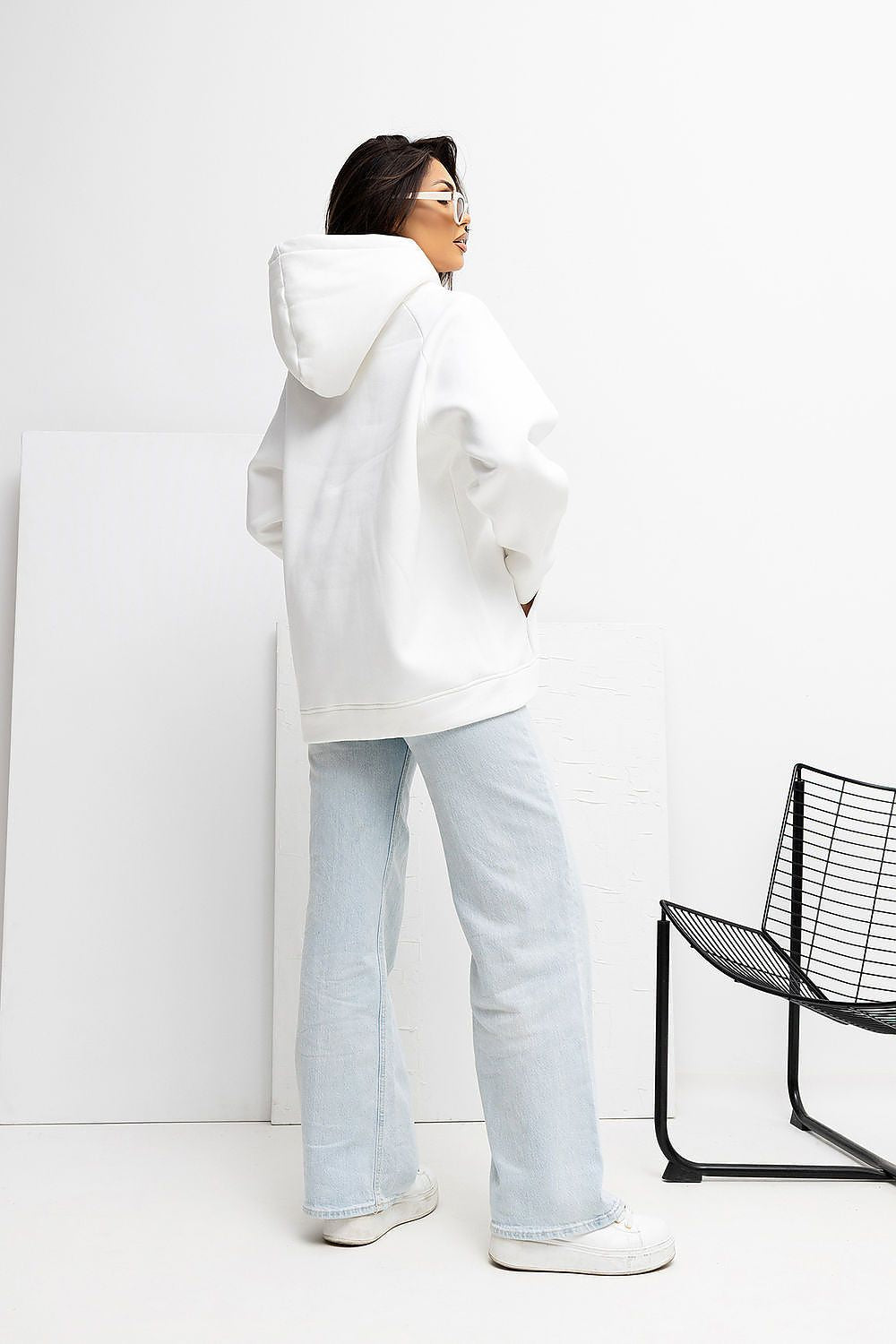 Back view of the Luxury Women's Casual Hoodie Sweatshirt by Rue Paris, highlighting the spacious hood and relaxed fit designed for modern comfort.