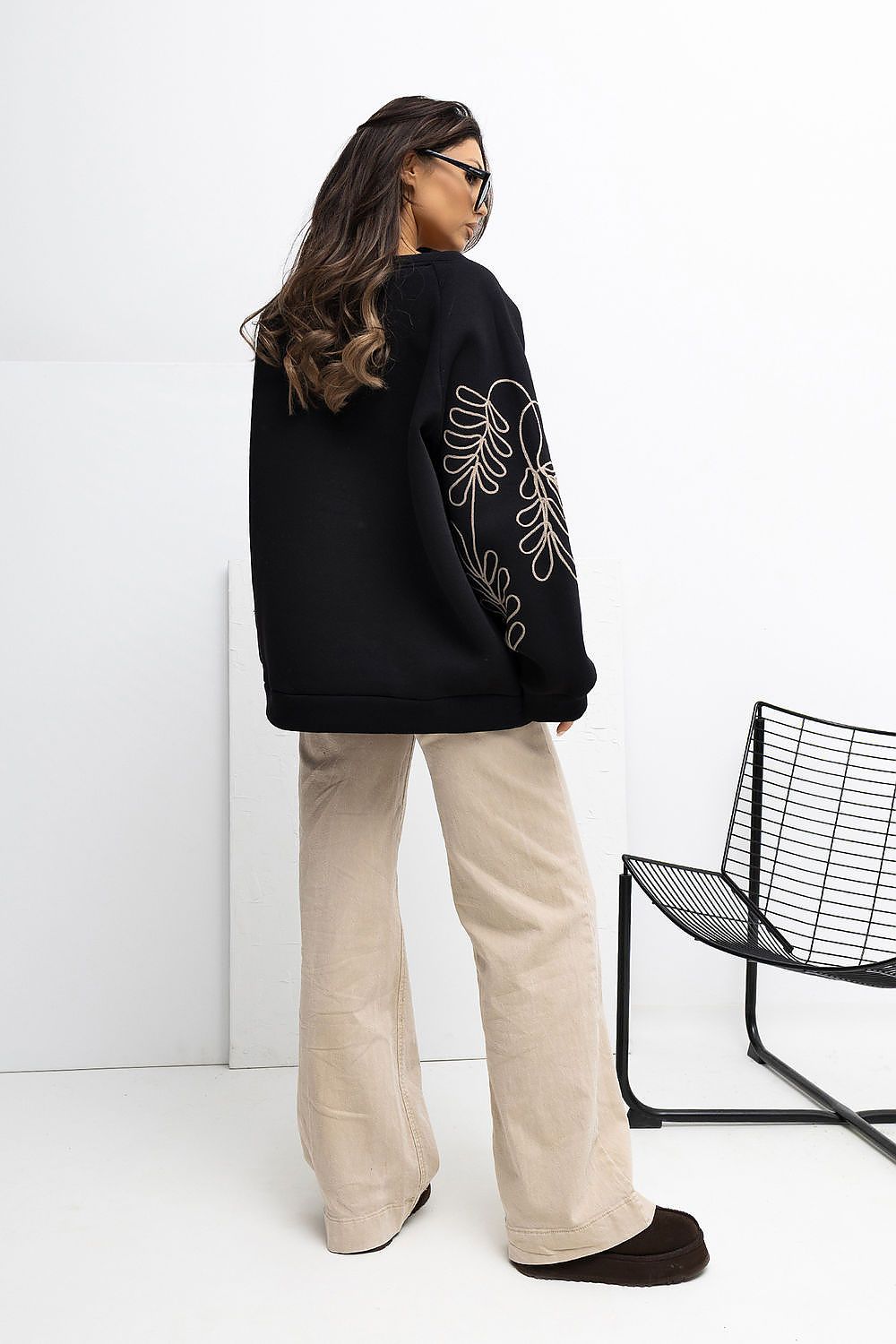 Fashionable Women's Embroidered Casual Sweatshirt by Rue Paris, featuring a round neckline and puffy sleeves, perfect for elevating your casual wardrobe.