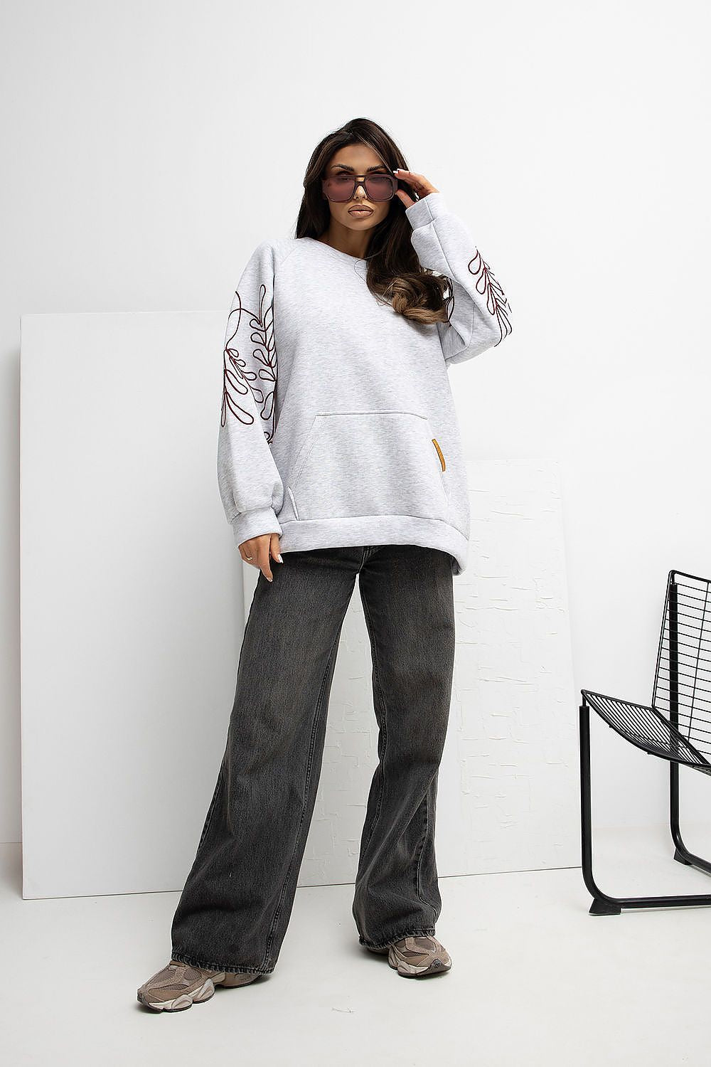 Luxurious Women's Embroidered Casual Sweatshirt by Rue Paris featuring intricate sleeve embroidery and kangaroo pocket, designed for style and comfort in EU size 0.