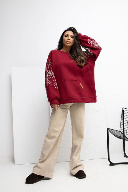 Elegant Women's Embroidered Casual Sweatshirt by Rue Paris displayed on a mannequin, highlighting the flattering silhouette and luxurious cotton blend.