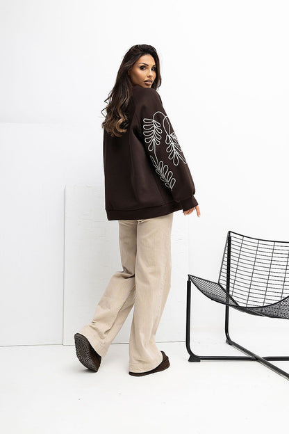 Sophisticated Women's Casual Sweatshirt by Rue Paris, highlighting unique embroidery details and a flattering fit for the modern woman.