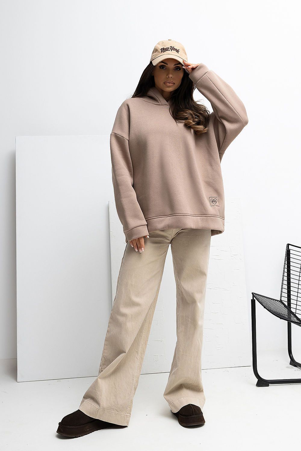 Close-up of Rue Paris Casual Loose Hoodie Blouse texture, highlighting the soft cotton-spandex blend that offers warmth and flexibility.