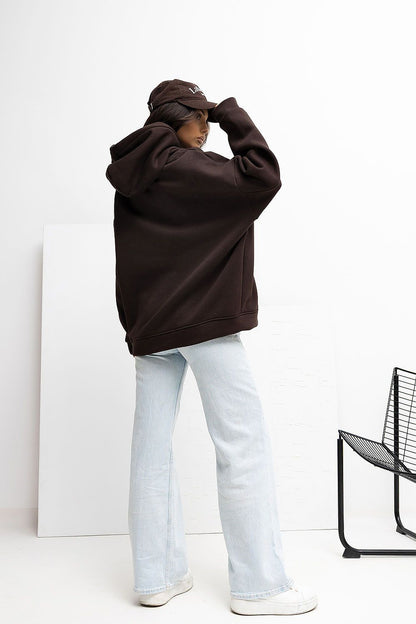 Stylish long sleeve hoodie, Rue Paris brand, perfect for colder days with sporty hood and minimalist appeal.