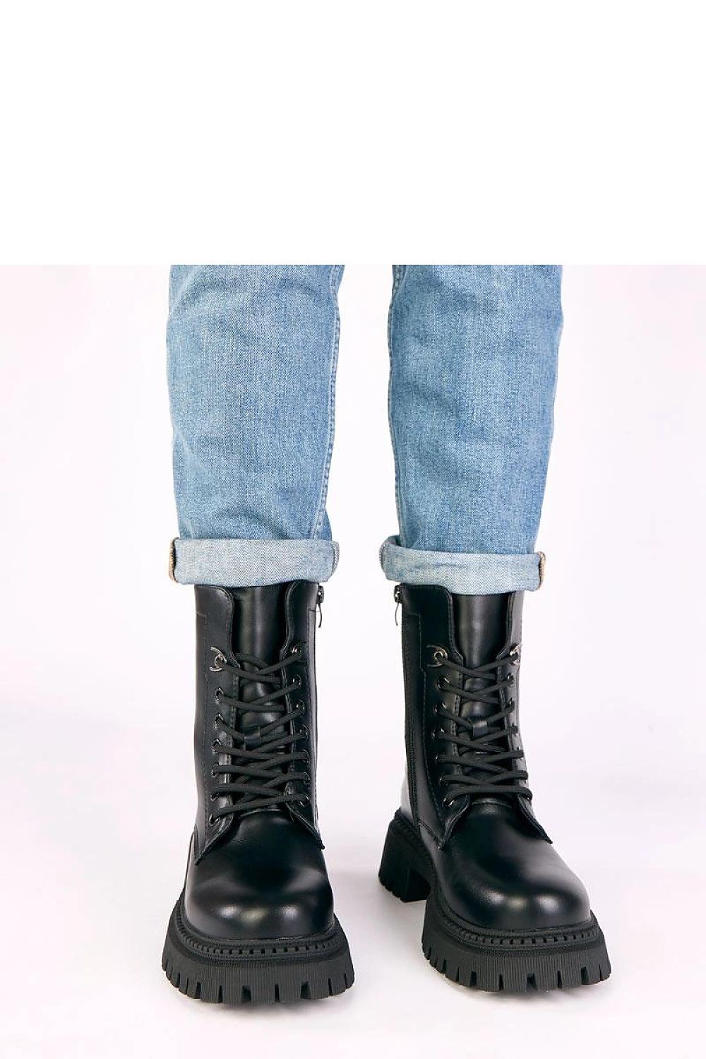 Chic and versatile women's faux leather ankle boots by Solea, designed for comfort and style, available in EU sizes 36-41.