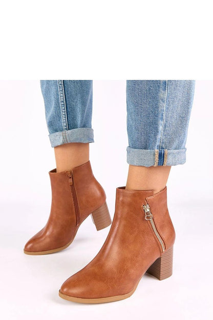 Stylish side view of Elegant Solea Ankle Boots highlighting the tapered shaft and elegant silhouette that flatters the leg.