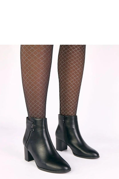 Elegant Solea Ankle Boots styled with casual and elegant outfits, perfect for both everyday wear and special occasions.