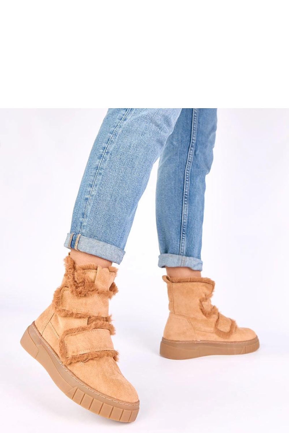 Close-up of Solea Eco Suede fur-lined boots highlighting the sustainable materials and plush lining for ultimate comfort.