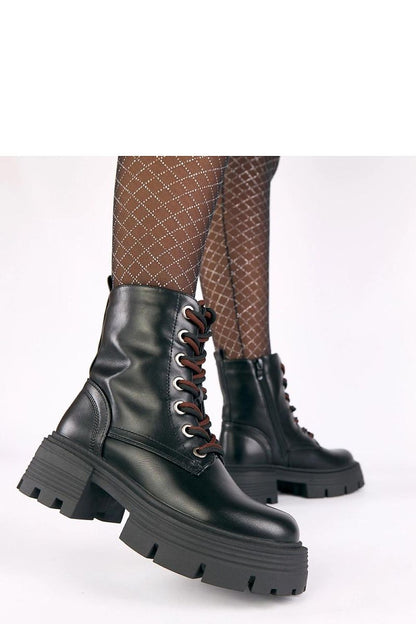 Close-up view of Solea Platform Boots showcasing the luxurious eco-leather material, padded soft lining, and practical side zipper closure for convenience.