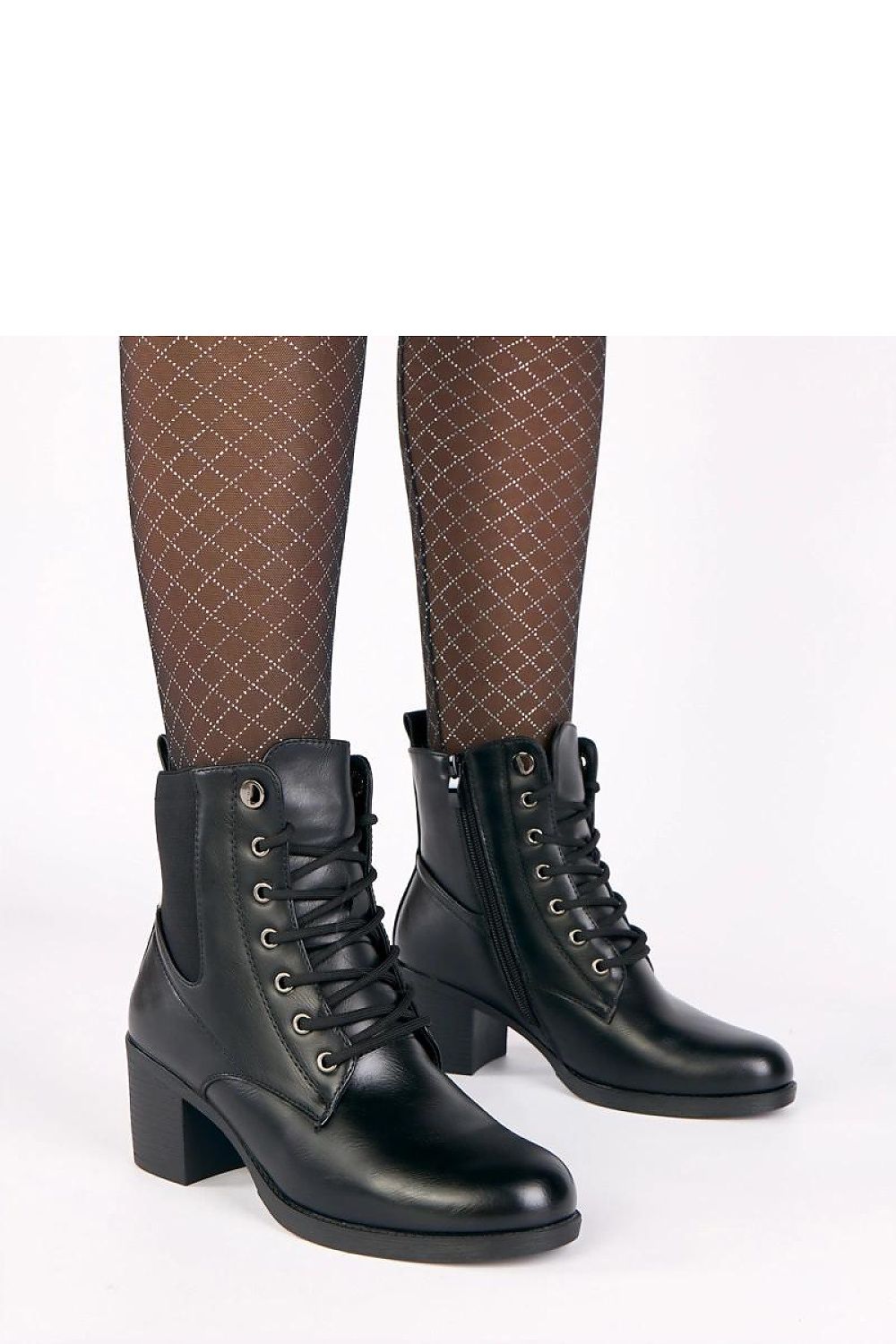 Solea Eco-Leather Heel Boots featuring a stylish elastic insert and lacing, crafted for comfort and elegance with a 6cm heel, showcasing a luxurious design perfect for any occasion.