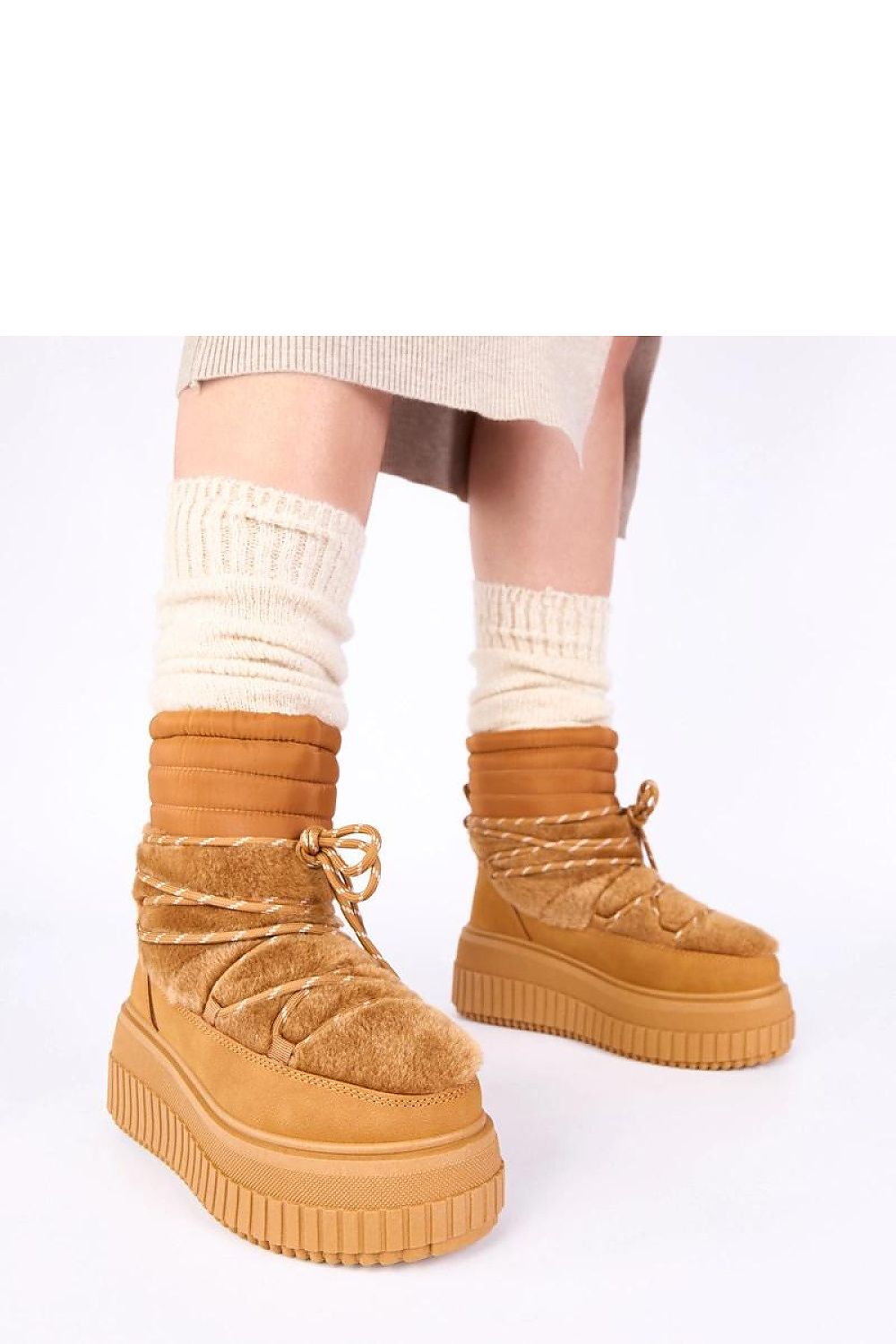 Luxury Solea Laced Snow Boots With Fur showcasing elegant design and high-quality synthetic leather, perfect for winter style and comfort.