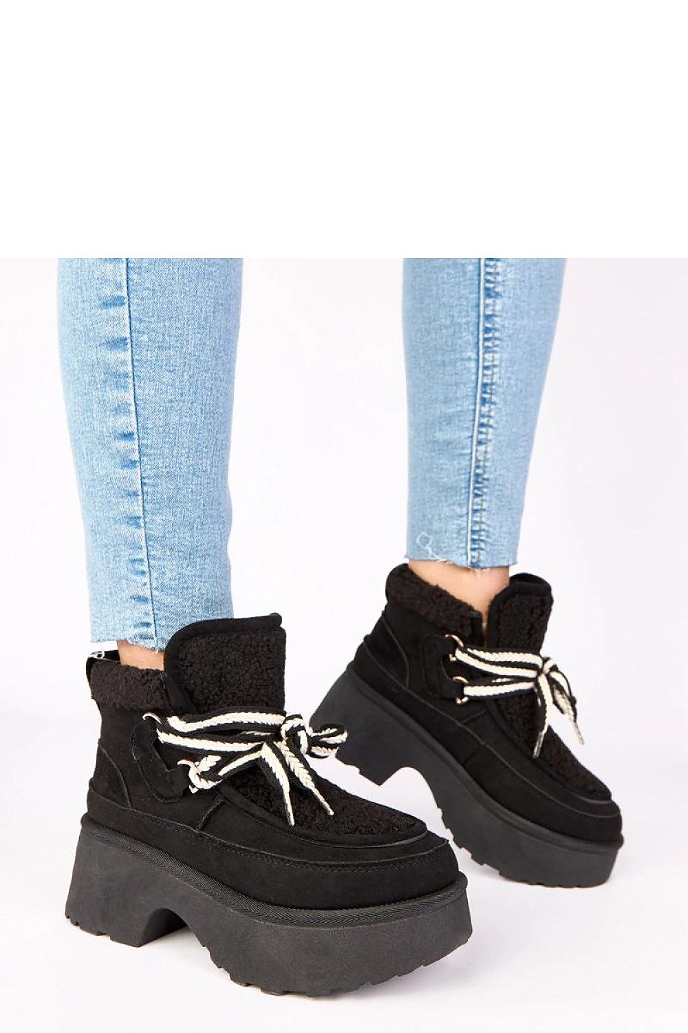 Solea Luxury Faux Suede Winter Snow Boots displayed outdoors, perfect for navigating snowy environments with style and warmth.