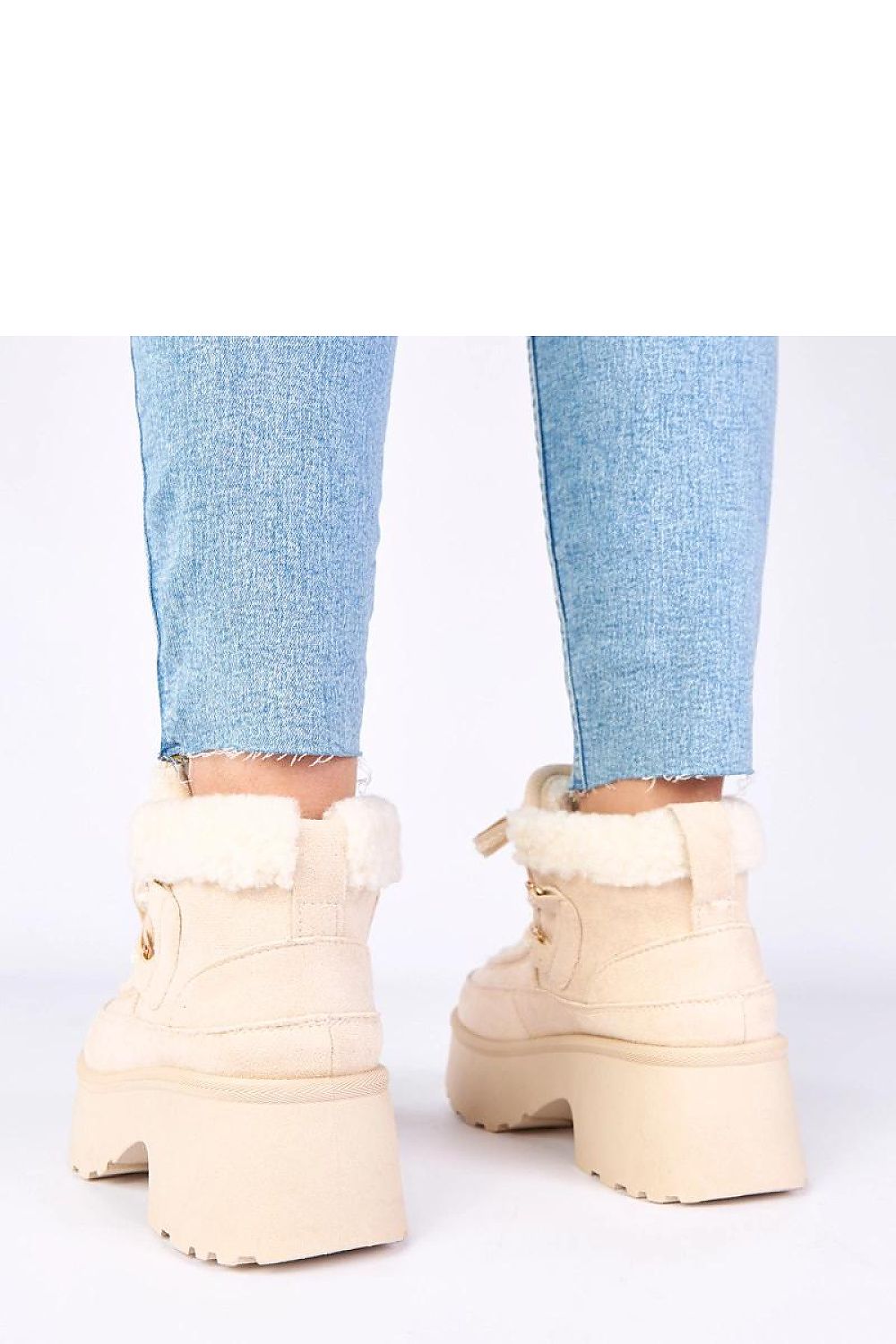 Close-up of Solea's Luxury Faux Suede Winter Snow Boots, showcasing the luxurious material, adjustable lace-up front, and protective fur lining, perfect for winter outings.