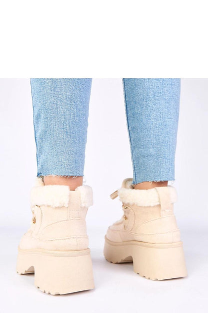 Close-up of Solea's Luxury Faux Suede Winter Snow Boots, showcasing the luxurious material, adjustable lace-up front, and protective fur lining, perfect for winter outings.