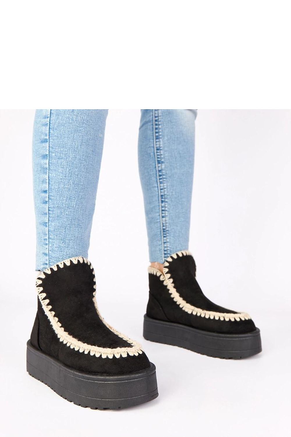 Luxurious Solea faux suede snow boots showcasing elegant design and functionality for stylish winter adventures.