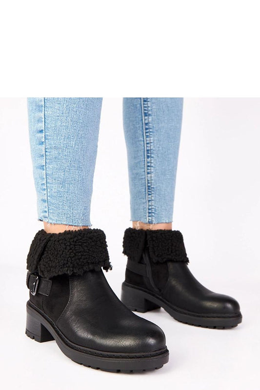 Elegant Ankle Boots with Rolled-Up Fur Shaft by Solea, showcasing a luxurious design perfect for winter fashion.