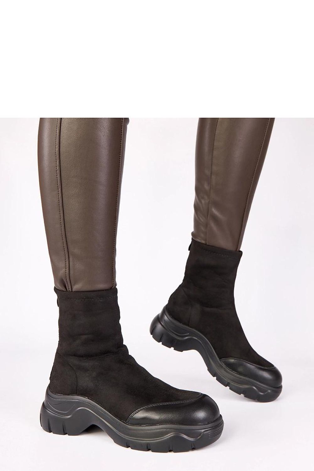 A chic and versatile pair of Solea Eco-Leather Boots perfect for casual styling, crafted for comfort and beauty.