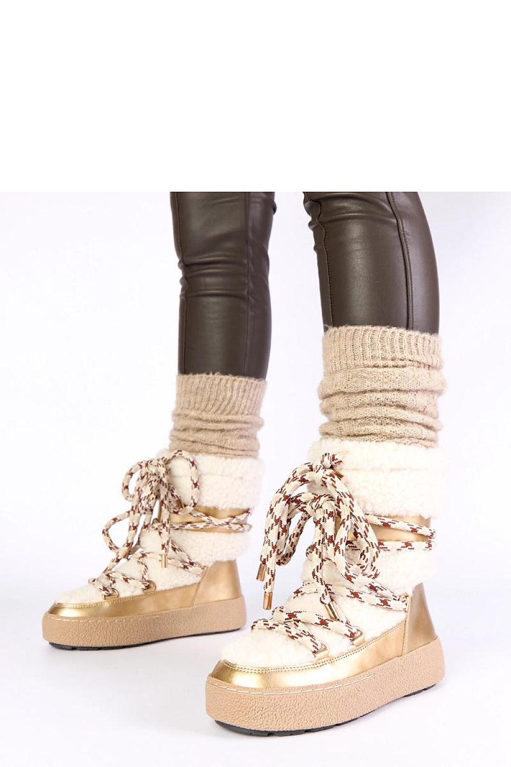 Solea Luxe Women's Snow Boots displayed alongside a winter outfit, demonstrating versatile styling options for seasonal wear.