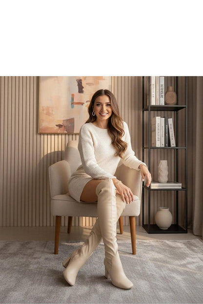 Close-up of the luxurious Beige Knee-High Pole Boots Louna by Gemre, featuring a comfortable padded interior and stable 8 cm heel for stylish confidence.