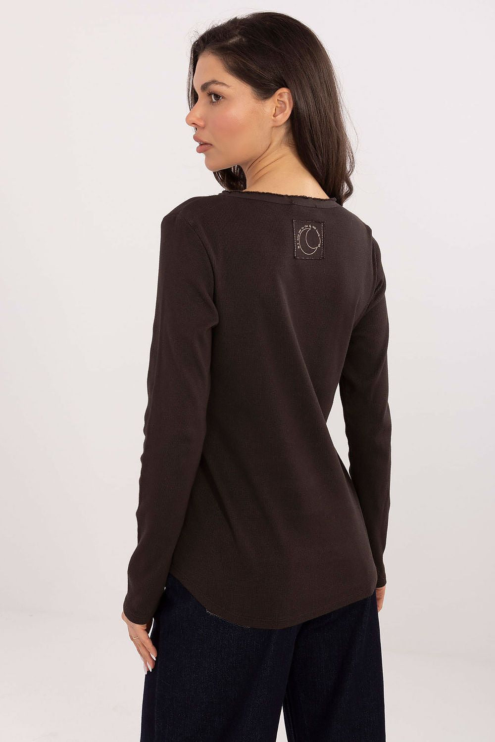 Back view of the Stylish Ribbed Long Sleeve Blouse by Factory Price, showcasing unique patch detailing and stylish ribbed fabric suited for various styles.
