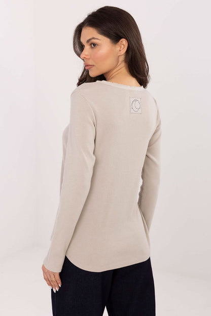 Close-up of the ribbed texture of the Stylish Long Sleeve Blouse from Factory Price, highlighting its quality craftsmanship and versatility, ideal for year-round fashion.