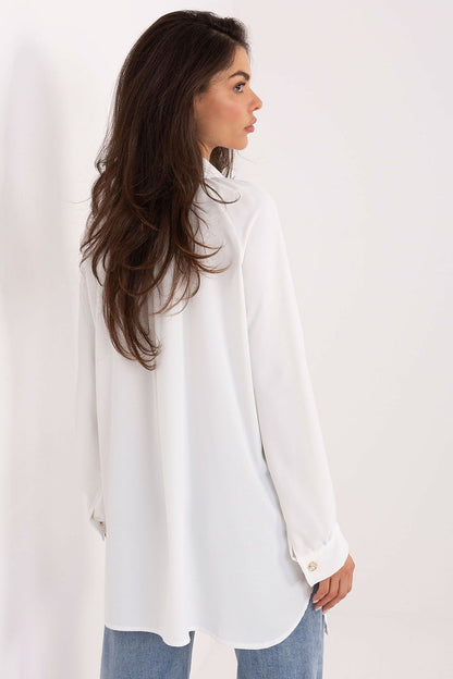 Model wearing the elegant long sleeve women's shirt with puff sleeves by Factory Price, demonstrating versatility in styling for a polished look.