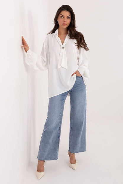 Flat lay of the Elegant V-Neck Blouse by Factory Price, featuring puff sleeves and a stylish V-neck design, ideal for versatile styling.