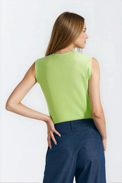 Close-up detail of the Elegant Lime Viscose Blouse by Nife, highlighting the delicate pleated shoulder design.