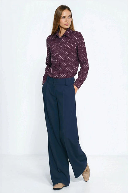 Close-up of the exquisite polka dot fabric on the Silk Long Sleeve Shirt by Nife, highlighting its luxurious silk texture.