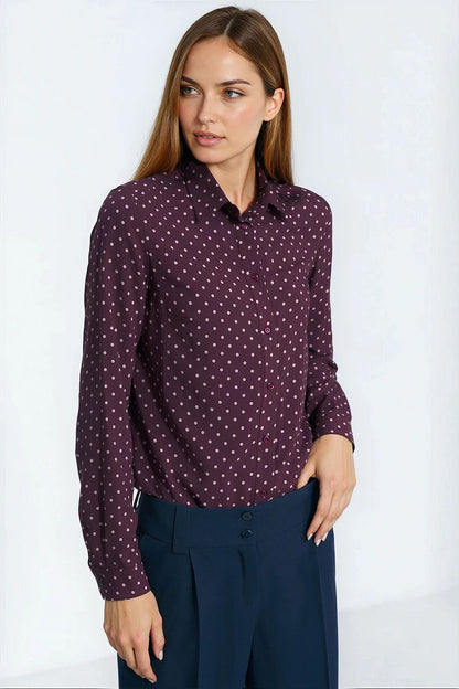 Elegant silk polka dot long sleeve shirt by Nife, showcasing a rich green hue and delicate collar, perfect for sophisticated autumn fashion.