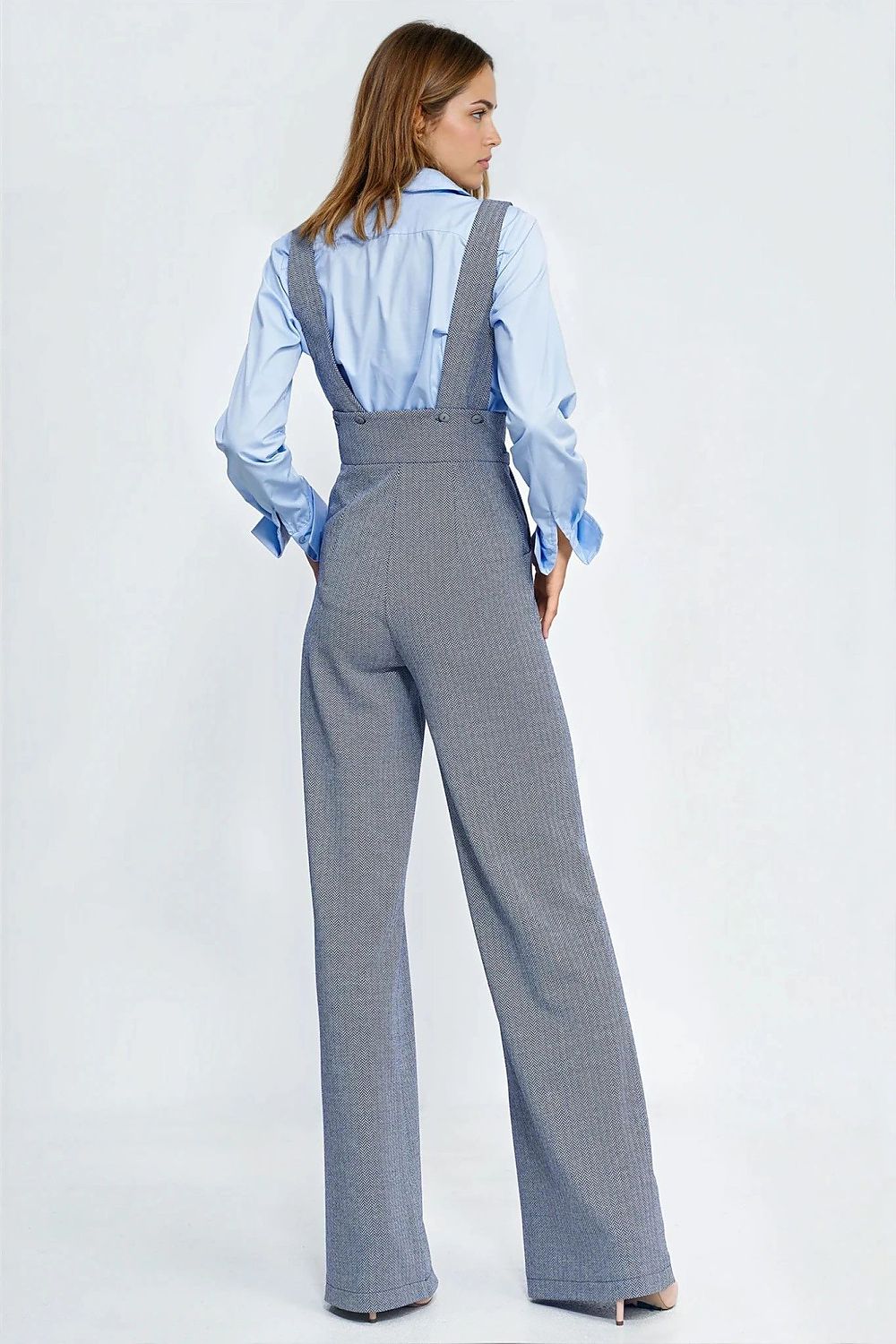 Chic wide-leg jumpsuit from Nife, showcasing luxurious fabric and versatile styling perfect for both casual and elegant events, sizes EU 34 to 42.