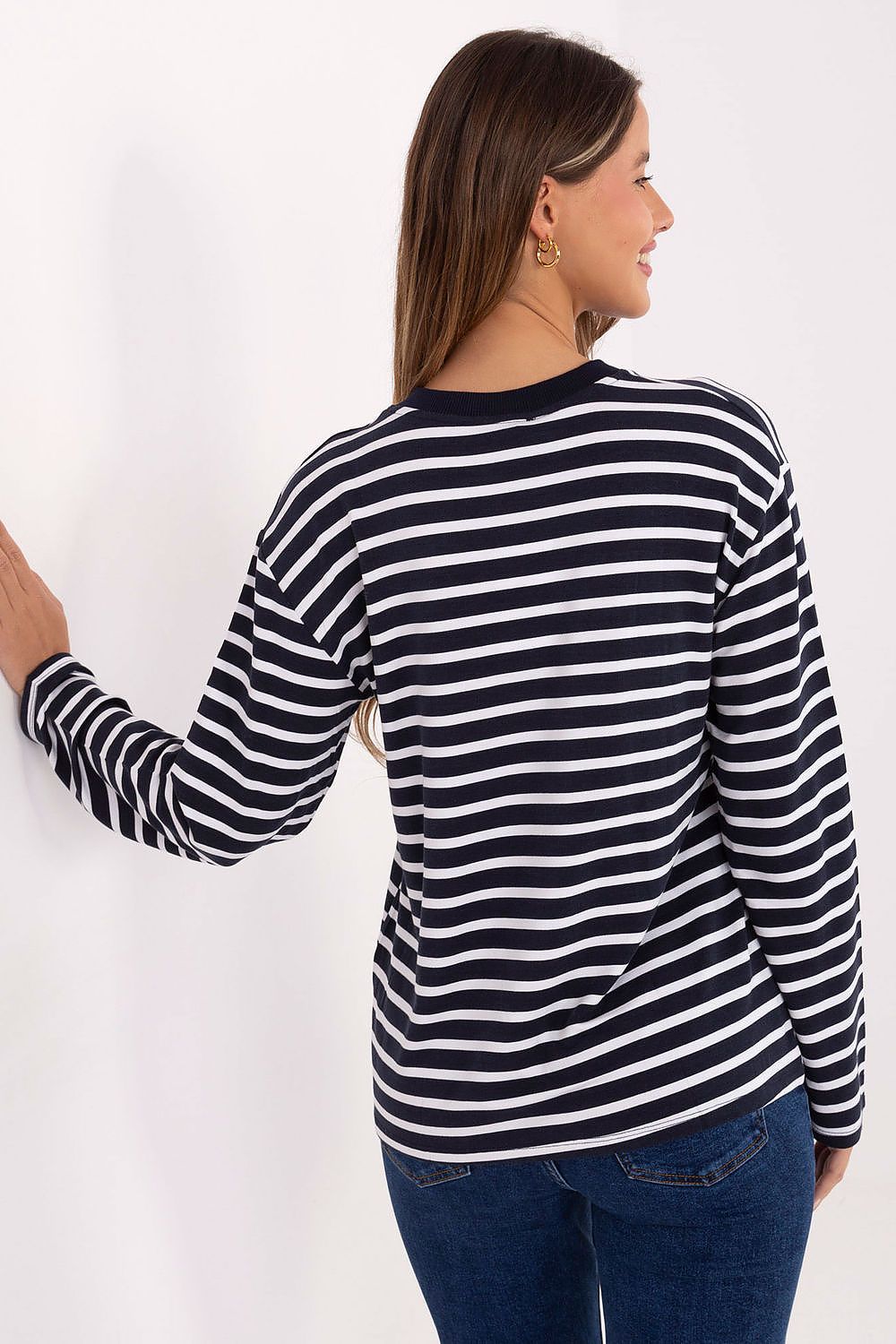 Full outfit display with Relevance Luxury Striped Blouse, styled with tailored trousers for a sophisticated look.