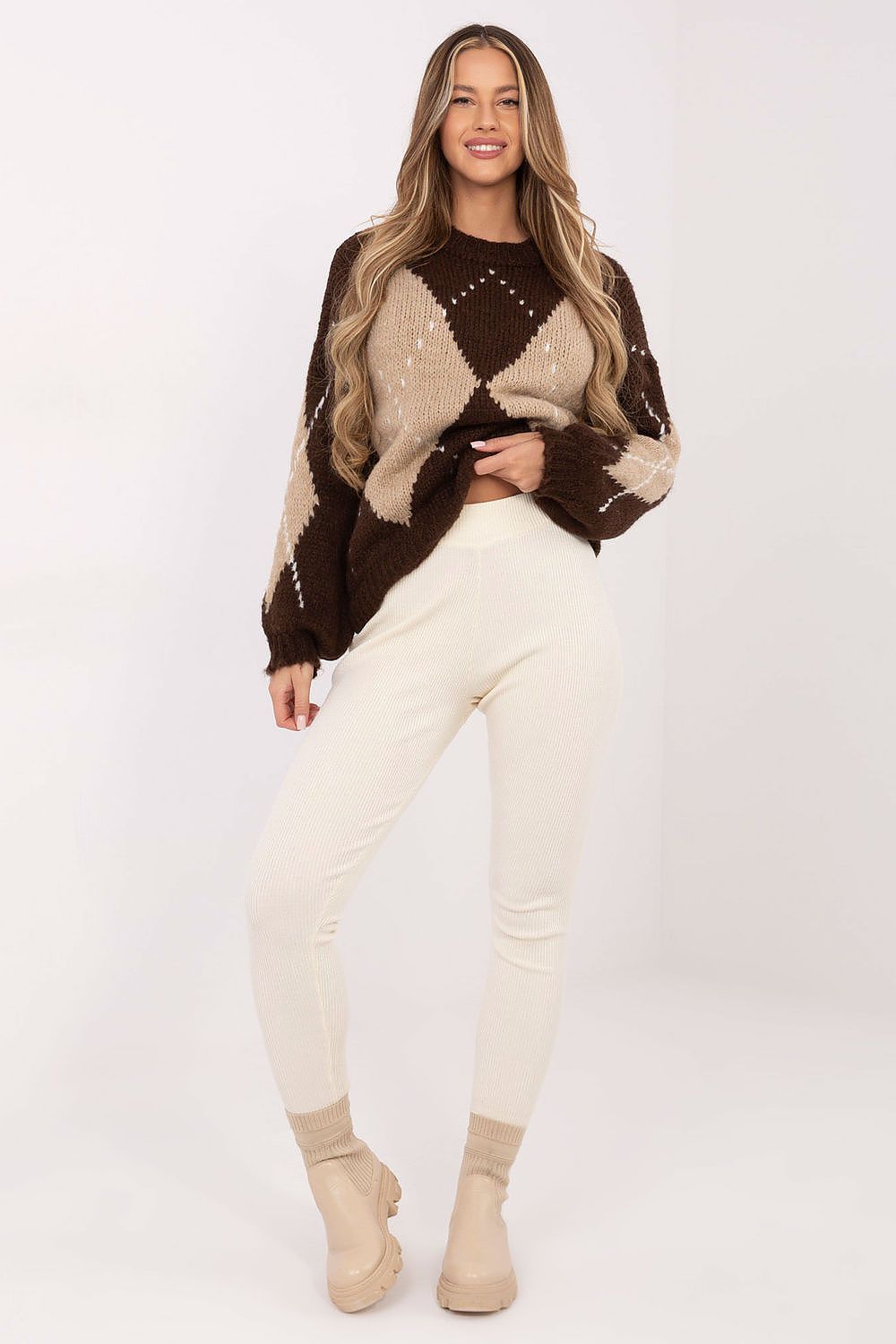 Close-up of the luxurious fabric of Italy Moda’s Geometric Pattern Sweater, highlighting the soft blend of materials and elegant puffy sleeves.