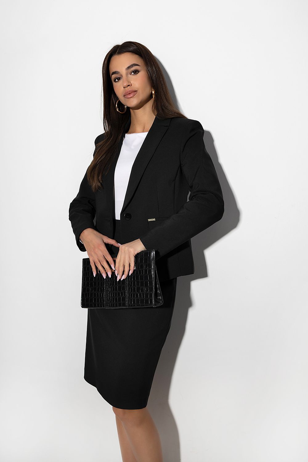 Elegant Black Pencil Skirt with Zipper by Cabba showcasing a sophisticated silhouette, perfect for work and events.