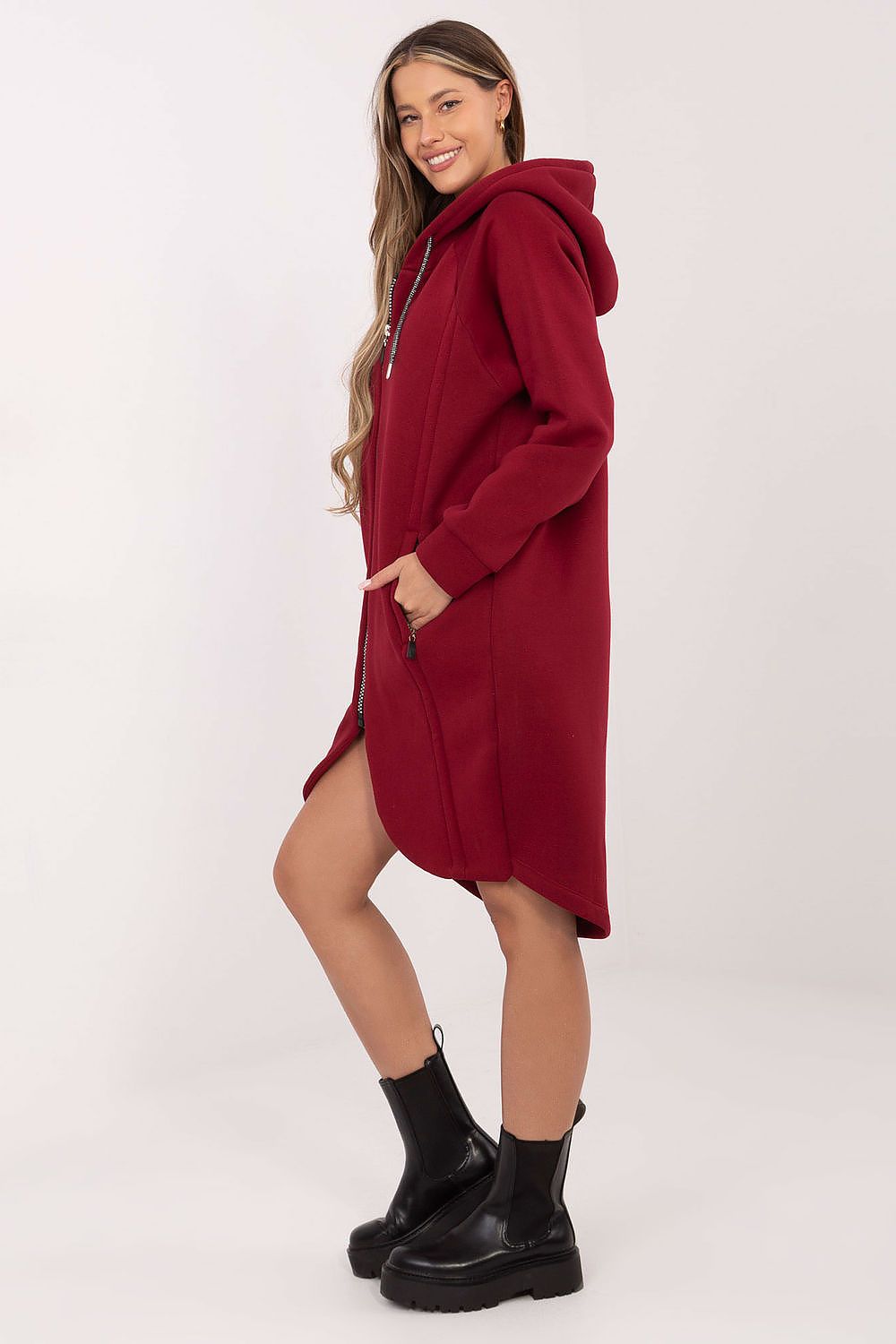 Elegant view of Relevance's Luxury Women's Long Hoodie Blouse showcasing the semi-circular hem and long sleeves, perfect for stylish layering.