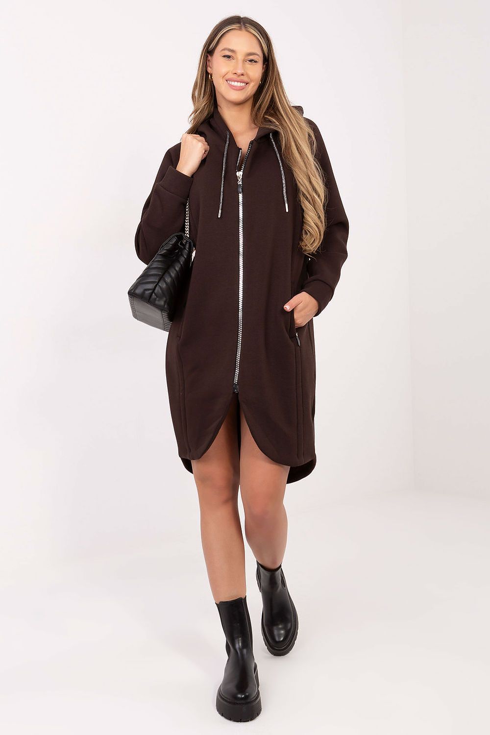 Close-up of high-quality fabric of Luxury Women's Long Hoodie Blouse by Relevance, showcasing the cotton-spandex material for a soft feel.