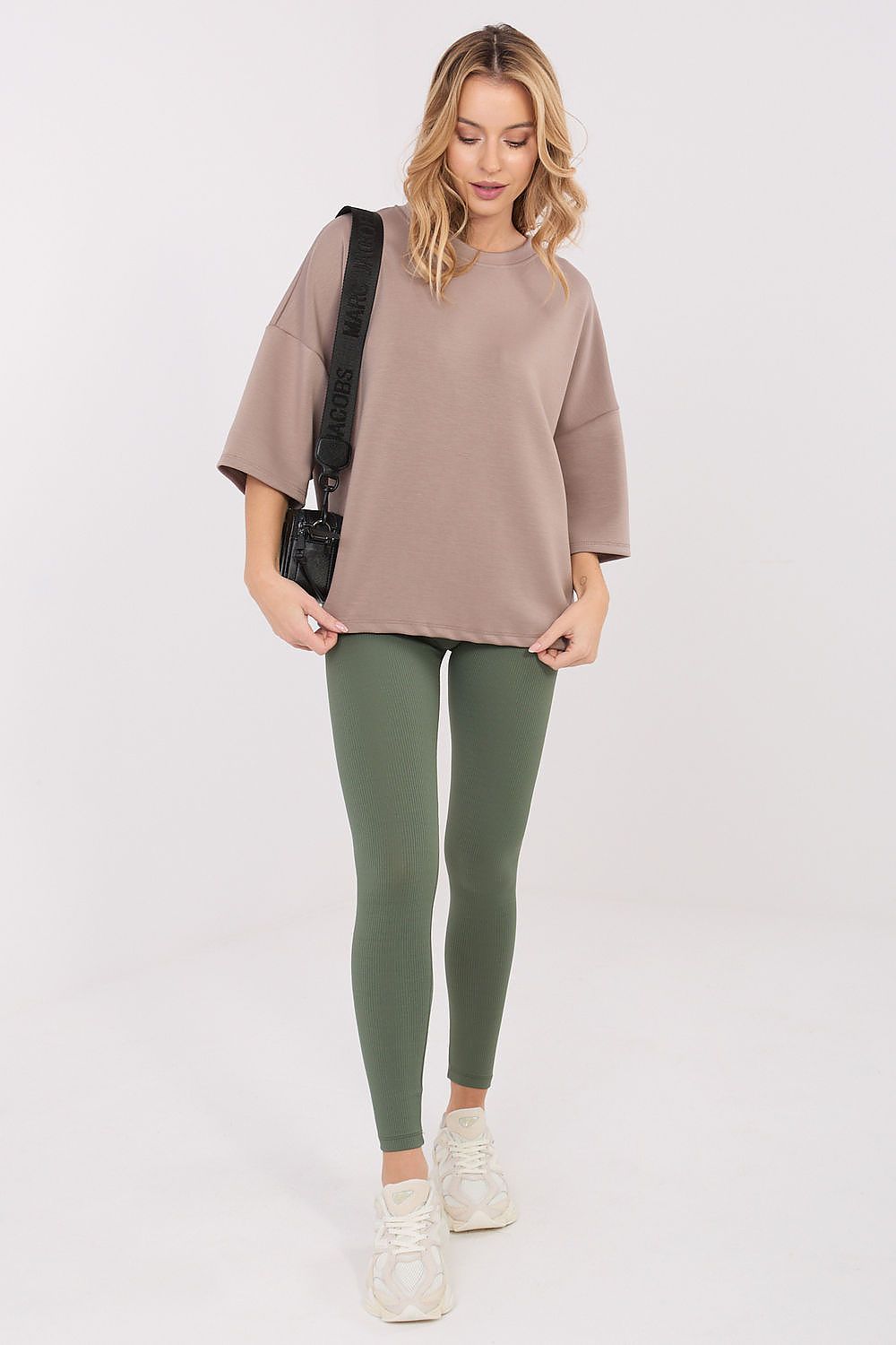 Elegant luxury women's long leggings by Relevance, featuring ribbed texture and high waist style, ideal for flattering silhouette and modern fashion.
