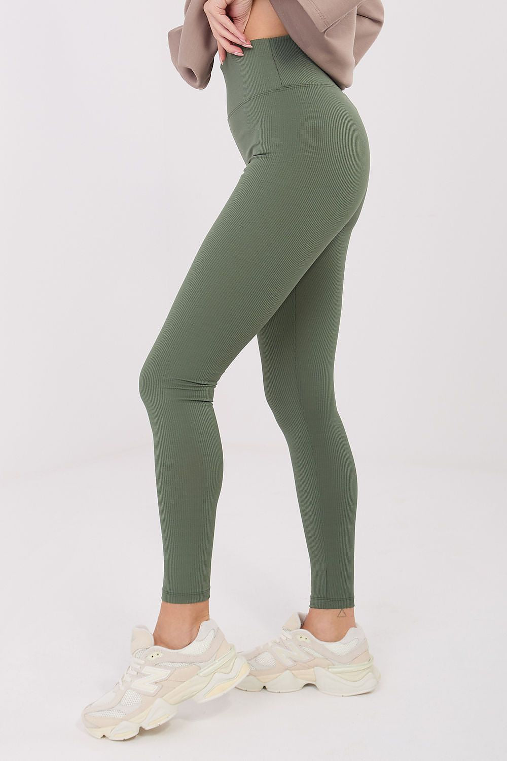 Luxury women's long leggings by Relevance, featuring high waist and tapered legs for a stylish fit designed for everyday and sport activities.